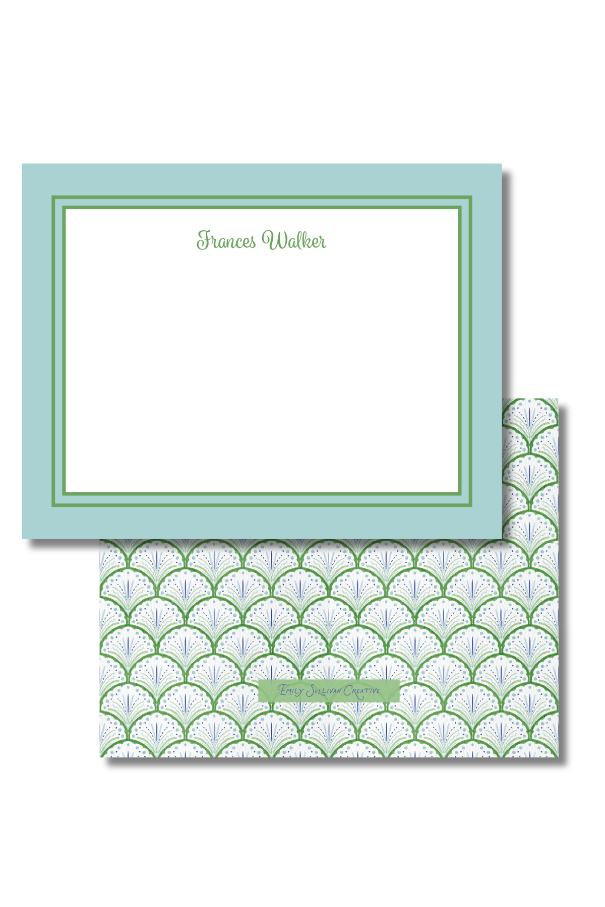 A personalized stationery set featuring a light blue card with a green border and the name 'Frances Walker' printed at the top, paired with a matching patterned envelope in green, white, and blue.